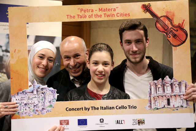 People pose for photos at ‘Italian Cello Trio’ concert, held at Al Hussein Cultural Centre, on Thursday, celebrating the twinning between Jordan’s Petra and Italy’s Matera cities (Photo courtesy of EU Delegation in Jordan)