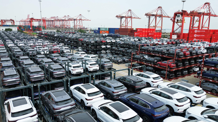 In this photo taken on Monday, BYD electric cars waiting to be loaded on a ship are stacked at the international container terminal of Taicang Port at Suzhou Port, in China’s eastern Jiangsu Province (AFP photo)