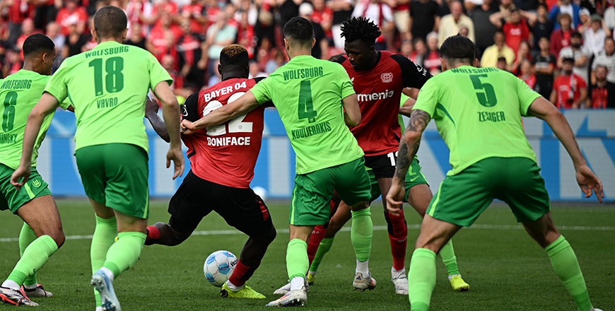Bayer Leverkusen's Nigerian forward #22 Victor Boniface (third left) shoots to score the 4-3 during the German first division Bundesliga football match between Bayer Leverkusen and VfL Wolfsburg in Leverkusen on Sunday (AFP photo)