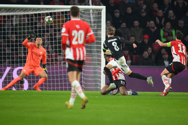 Arsenal's Norwegian midfielder #08 Martin Odegaard scores his team's sixth goal during the UEFA Champions League round of 16 first leg football match between PSV Eindhoven (NED) and Arsenal FC (ENG) at the the PSV Stadion, in Eindhoven, on Tuesday (AFP photo)