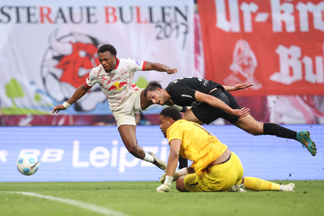 Leipzig’s Belgian forward #11 Lois Openda scores his team’s third goal during the German first division Bundesliga football match between RB Leipzig and SC Freiburg in Leipzig, eastern Germany, on Saturday (AFP photo)