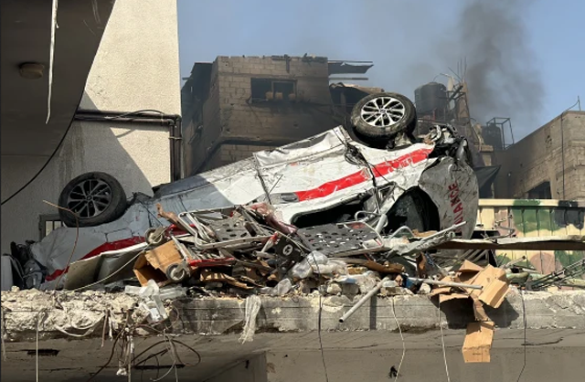 A damaged ambulance outside Kamal Adwan Hospital in Beit Lahia on Saturday (AFP photo via Getty Images)