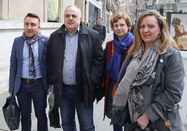 General Secretary of UNSA Railway Union Roger Dillenseger (2nd left) arrives with colleagues ahead of a meeting with Minister for Transport Elisabeth Borne in Paris on Thursday (AFP photo)
