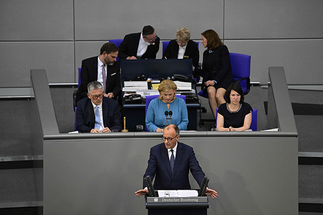 German Chancellor Friedrich Merz delivers his first government statement during a session at the Bundestag, the German lower house of parliament, in Berlin on Wednesday (AFP photo)