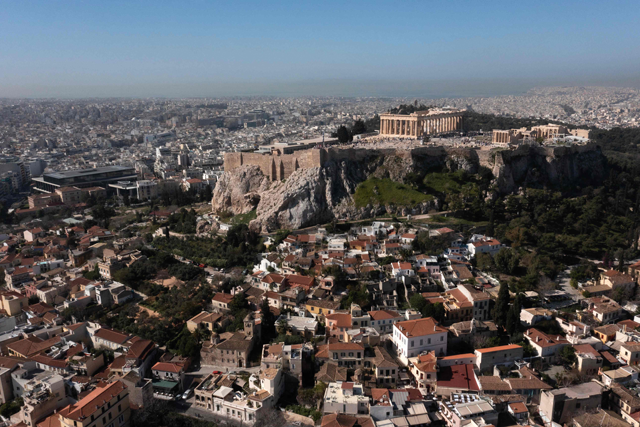 This aerial photograph taken on Friday shows Parthenon ancient temple on the top of the Acropolis hill in Athens (AFP photo)