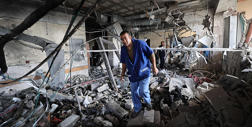 Graphic content / Palestinian hospital staff inspects the destruction inside Nasser hospital in Khan Yunis in the southern Gaza Strip, following an Israeli strike early on May 13, 2025 in which Palestinian journalist Hassan Aslih was killed along with several others (AFP photo)