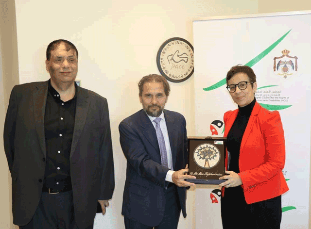 HH Prince Mired presents EU Ambassador to Jordan Maria Hadjitheodosiou with a plaque, in recognition of her support for people with disabilities, on Sunday (Petra photo)