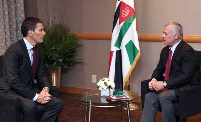 His Majesty King Abdullah meets with International Rescue Committee President and CEO David Miliban in New York on Tuesday (Photo courtesy of Royal Court)