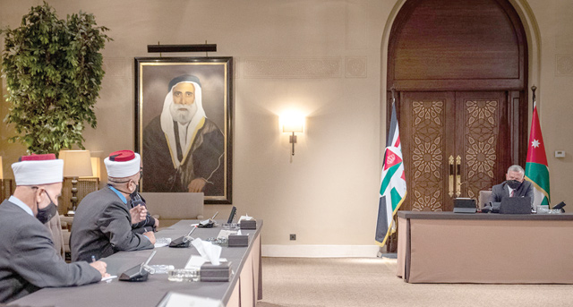 His Majesty King Abdullah meets with the chairman and board members of the Zakat Fund at Al Husseiniya Palace on Tuesday (Photo courtesy of Royal Court)
