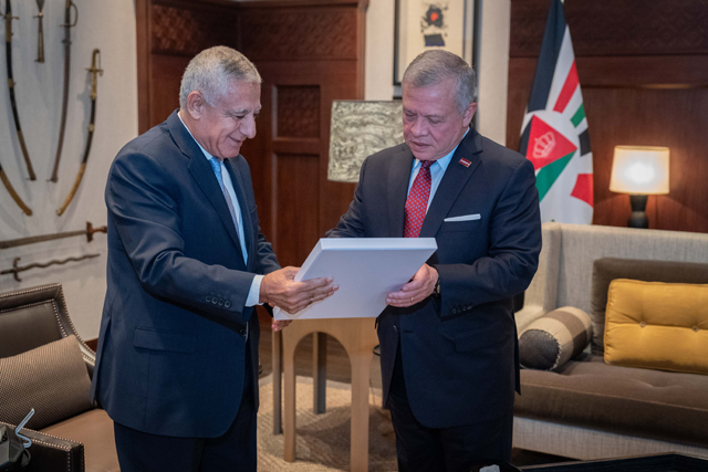 His Majesty King Abdullah receives the Judicial Council’s report for the year 2022 from Judicial Council President Mohammad Ghazou at Al Husseiniya Palace on Sunday (Photo courtesy of Royal Court)