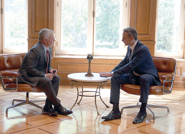 His Majesty King Abdullah meets with Greek Prime Minister Kyriakos Mitsotakis in Athens on Wednesday (Photo courtesy of Royal Court)