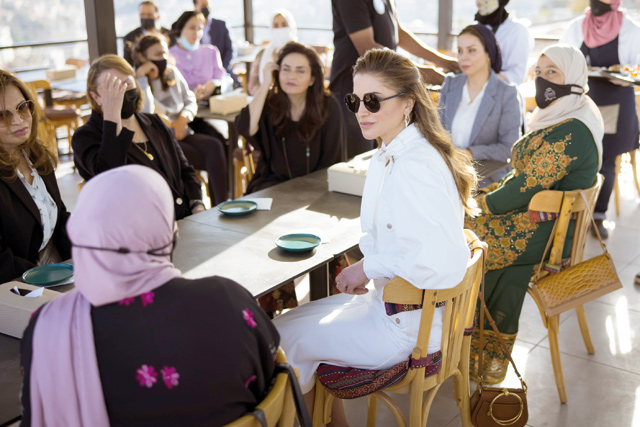 Her Majesty Queen Rania visits Dar Ne’meh gift shop and café at the Amman Citadel, a project run by the Princess Taghrid Institute for Development and Training, on Monday (Photo courtesy of Royal Court)
