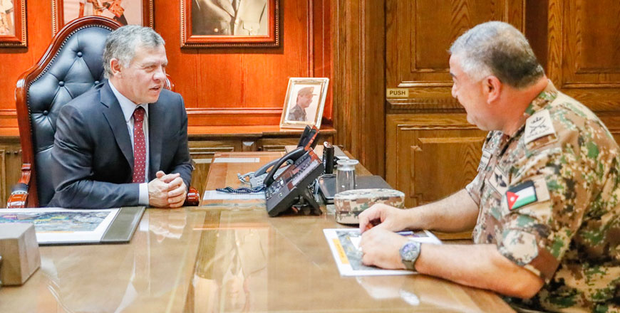 His Majesty King Abdullah, the Supreme Commander of the Jordan Armed Forces-Arab Army (JAF), meets with Chairman of the Joint Chiefs-of-Staff Lt. Gen. Mahmoud Freihat during a visit to the General Command of JAF on Monday (Photo courtesy of Royal Court)
