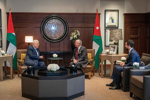 His Majesty King Abdullah and Palestinian President Mahmoud Abbas during a meeting attended by HRH Crown Prince Hussein at Al Husseiniya Palace on Tuesday (Photo courtesy of Royal Court)
