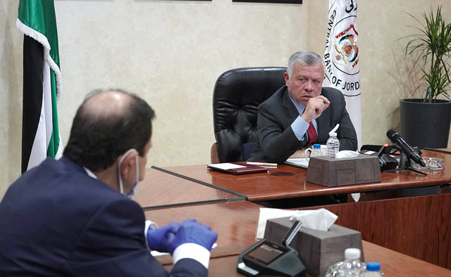 His Majesty King Abdullah speaks during a visit to the Central Bank of Jordan on Tuesday (Photo courtesy of Royal Court)