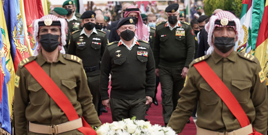 His Majesty King Abdullah, the Supreme Commander of the Jordan Armed Forces-Arab Army, accompanied by HRH Crown Prince Hussein, attends the JAF’s ceremony at the memorial site for the martyrs of Al Karamah Battle on its 54th anniversary on Monday (Photo courtesy of Royal Court)