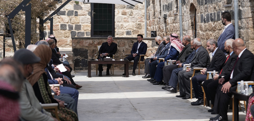 His Majesty King Abdullah speaks during a meeting with a number of local community leaders in Umm Qais in the northern governorate of Irbid, attended by HRH Crown Prince Hussein, on Sunday (Photo courtesy of Royal Court)