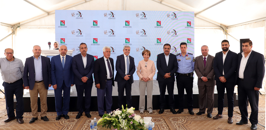 HRH Princess Basma poses for a group photo during an event to honour the participants and supporters of the Queen Alia Competition for Social Responsibility on Wednesday (Petra photo)