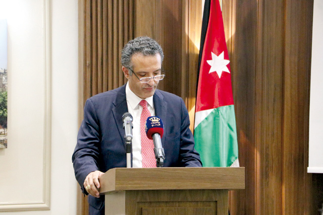 Deputising for HRH Princess Sumaya, Tourism Minister Nayef Al Fayez delivers a speech during an event organised by the Department of Antiquities on Tuesday  (Petra photo)