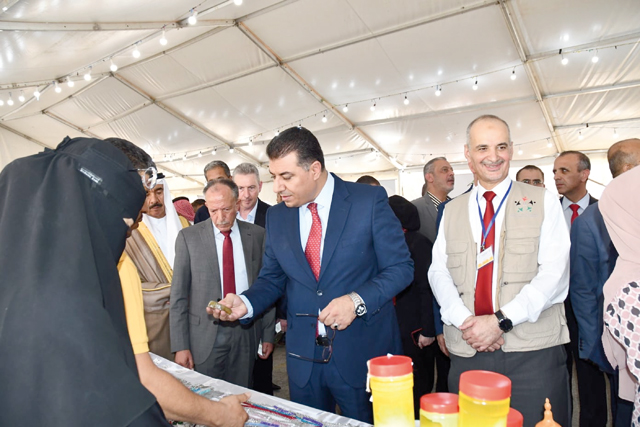 Agriculture Minister Khalid Hneifat during the inauguration of the cooperative agricultural summer products festival at Al Hussein Parks on Thursday (Petra photo)