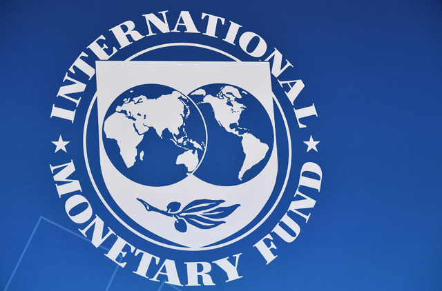 This file photo taken on April 11, shows the seal of the International Monetary Fund at IMF headquarters in Washington, DC (AFP photo)