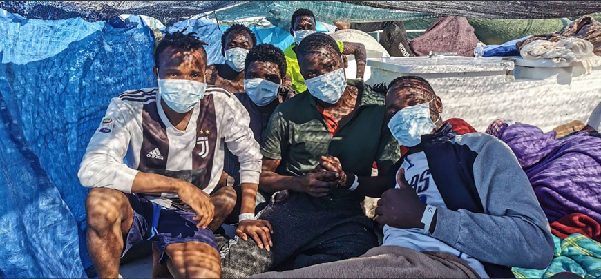 This photo, obtained on Saturday, shows men onboard the Banksy-funded MV Louise Michel rescue vessel in the Mediterranean Sea, which had sent out a distress signal Friday with more than 200 migrants onboard (AFP photo)