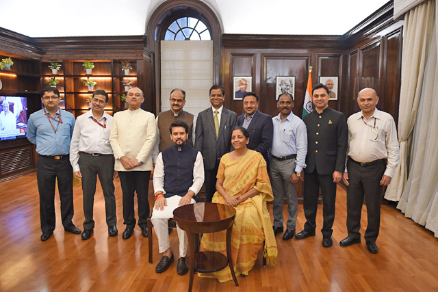 This photo shows Indian Finance Minister Nirmala Sitharaman (right) with Minister of State for Finance Anurag Thakur (left) and her staff before finalising the 2019-20 union budget at her office in New Delhi on Thursday (AFP photo)