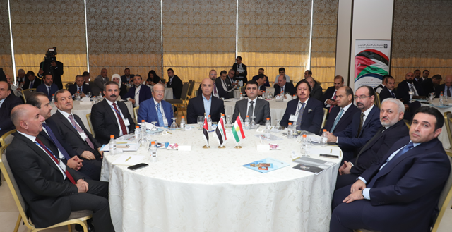 Investment Minister Khairy Amr and guests during the Jordan-Kurdistan Investment Forum, organised by the Jordanian Businessmen Association on Saturday (Petra photo)