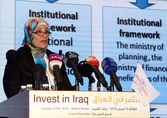 Director general of the Iraqi ministry of planning, Azhaar Hussein, speaks during the Kuwait international conference for the reconstruction of Iraq in Kuwait City, on Tuesday (AFP photo)