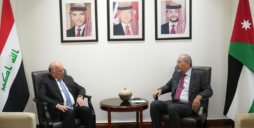 Deputy Prime Minister and Foreign Minister Ayman Safadi on Sunday receives his Iraqi counterpart Fuad Hussein (Petra photo)