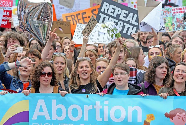 In this photo taken on September 30, 2017,  protesters hold up placards as they take part in the March for Choice, calling for the legalising of abortion in Ireland after the referendum announcement, in Dublin (AFP file photo)