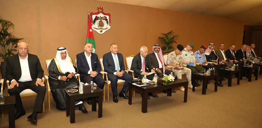 Royal Court Chief Yousef Issawi meets with leaders and representatives of Zarqa's Ruseifa District at the Royal Hashemite Court on Monday (Petra photo)