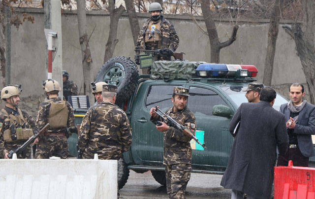 Afghan officials inspect the site after a suicide bomb attack in the Shash Darak area of Kabul, near NATO headquarters and not far from the US embassy in Kabul, Afghanistan, on Saturday (Anadolu Agency photo)