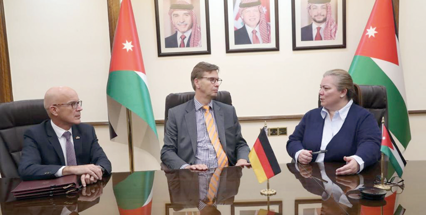 Minister of Planning and International Cooperation Zeina Toukan, Director of the German Development Bank in Jordan Mark Schwiete and German Ambassador Bertram von Moltke during a signing ceremony of a grant agreement on Thursday (Photo courtesy of Ministry of Planning and International Cooperation)