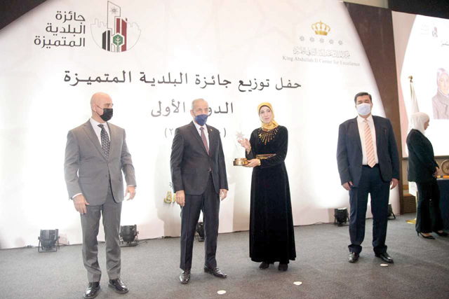 Deputising for His Majesty King Abdullah, Deputy Prime Minister and Minister of Local Administration Tawfiq Krishan attends the award ceremony of the first edition of the Distinguished Municipality Award on Wednesday (Petra photo)
