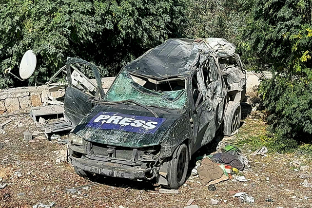 This photo shows a car marked ‘Press’ at the site of an Israeli airstrike that targeted an area where a number of journalists were located in the southern Lebanese village of Hasbaya on Friday (AFP photo)