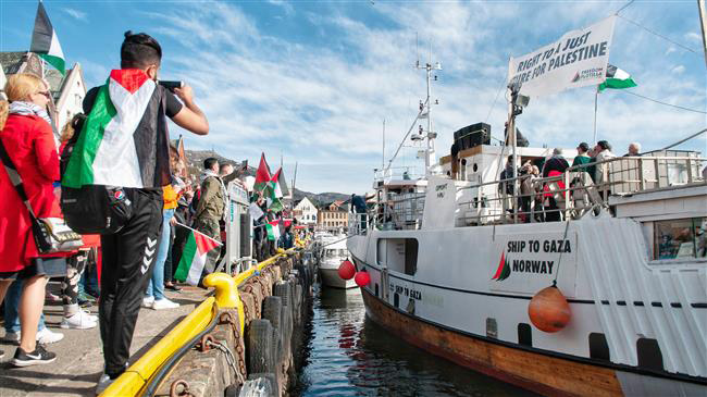 A ship prepares to set sail for Gaza as part of an attempt to bust an Israeli brigade on May 22  (AFP photo)