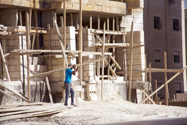 The Ministry of Labour reduced work permit fees for the agricultural and construction sectors before announcing its latest measure of shutting the door to 28 professions for migrant workers on Tuesday (Photo by Amjad Ghsoun)