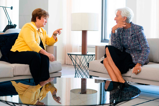 Former International Monetary Fund (IMF) managing director Christine Lagarde (right) greets Kristalina Georgieva (left) who is the nominee for her position at the IMF headquarters in Washington, DC, on Friday  (AFP photo)
