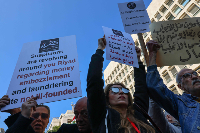 Lebanese protesters demonstrate against the monetary policies of Lebanon's Central Bank governor in the capital Beirut, on Wednesday (AFP photo)