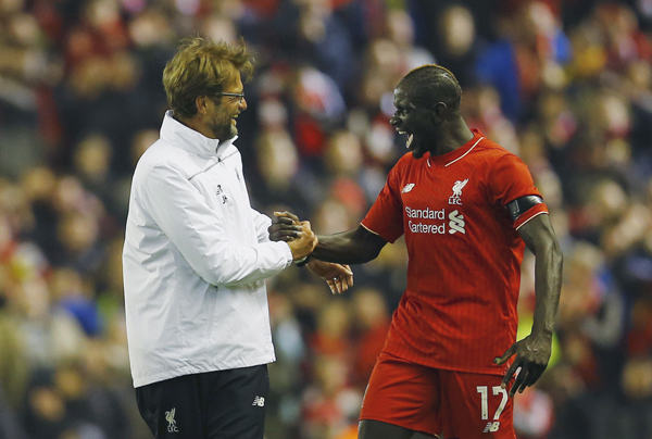Liverpool's Mamadou Sakho (right) and manager Juergen Klopp celebrate after winning the UEFA Europa League quarter-final second leg match against Borussia Dortmund on April 14 (Reuters photo)