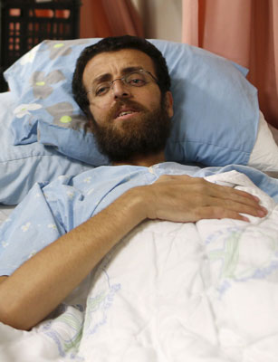 Palestinian journalist Mohammed Al Qiq, 33, who has been on hunger strike for more than 70 days to protest at his administrative detention in an Israeli jail, is seen at Haemek Hospital in the northern Israeli city of Afula on Friday (Reuters photo)