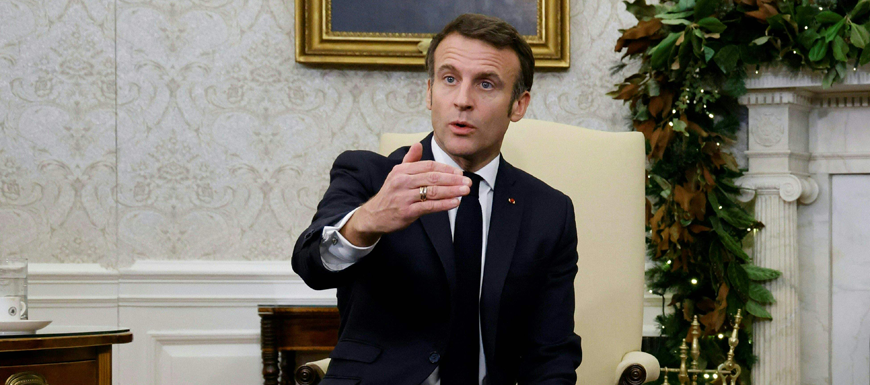French President Emmanuel Macron speaks during a meeting with US President Joe Biden in the Oval Office of the White House in Washington, DC, on Thursday (AFP photo)