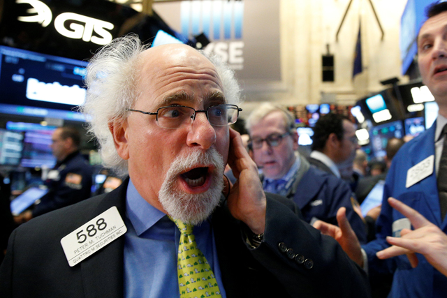 Trader Peter Tuchman works on the floor of the New York Stock Exchange in the Manhattan borough of New York, New York, US, on Tuesday (Reuters photo)