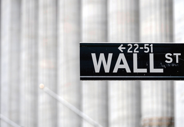 A Wall Street sign near the New York Stock Exchange is seen in New York City, on Monday (AFP photo)