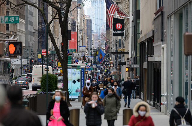 American consumers are this month feeling significantly more confident and have a much more favourable view of the economy than in March, according to a survey released, on Tuesday  (AFP photo)