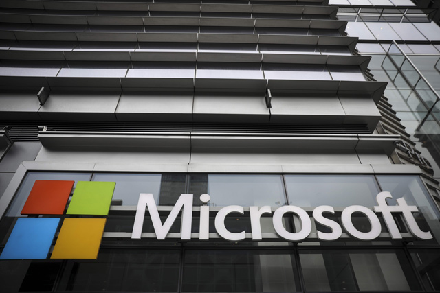 The Microsoft logo is displayed outside the Microsoft Technology Centre near Times Square, on June 4, 2018 in New York City   (AFP file photo)