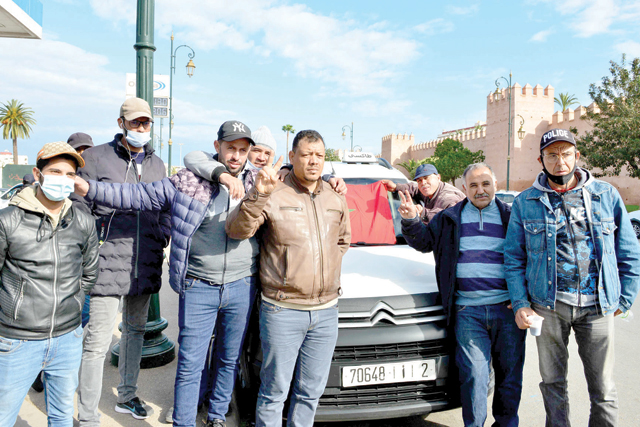 Moroccan taxi drivers take part in a strike to protest spiralling fuel costs, in the capital Rabat, on Monday (AFP photo)