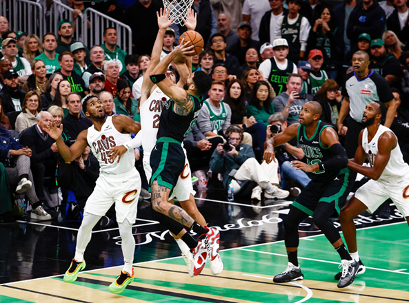Jayson Tatum #0 of the Boston Celtics shoots against Donovan Mitchell #45 and Georges Niang #20 of the Cleveland Cavaliers during the fourth quarter of the Emirates NBA Cup at TD Garden on Wednesday in Boston, Massachusetts (AFP photo)