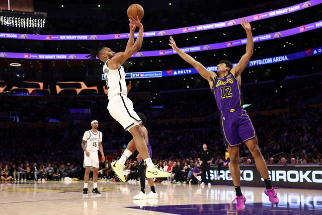 Tosan Evbuomwan #12 of the Brooklyn Nets shoots the ball against Max Christie #12 of the Los Angeles Lakers during the second quarter at Crypto.com Arena on Saturday in Los Angeles, California (AFP photo)